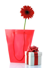 gift and red flower