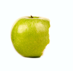 Tasty green apple on a white background