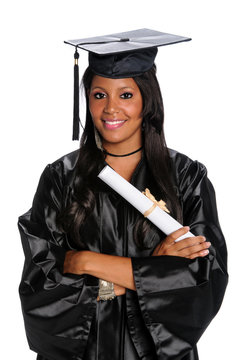 Young Woman Dressed in Graduation Gown and Mortarboard