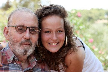 granddad or grandpa with granddaughter or grandchild