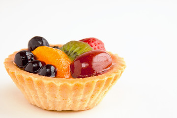 Colorful miniature fruit tart - shallow DOF, not isolated