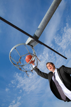 businessman pitching a hoop