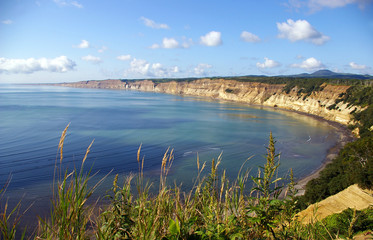Bay on seaside of the island Kunashir. Kurily