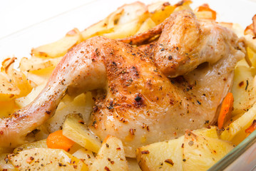 Potato with a hen on grill .Whole Roast chicken