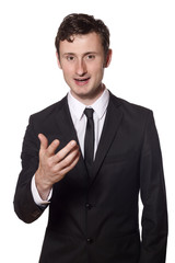 young businessman is talking to the viewer of this picture