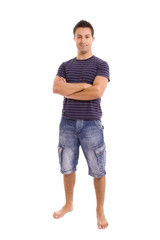 young casual man full body in a white background