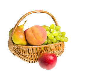 hamper with fruits isolated on the white background