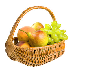 hamper with fruits isolated on the white background