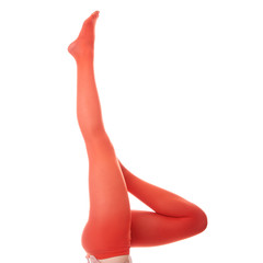 Beautiful woman legs in red stockings