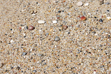 Abstract background with colorful stones at the beach