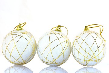Three white Christmas tree balls
