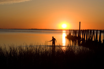 Fototapeta premium Crabbing At Sunset