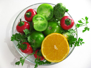 Fresh vegetables and fruits in round bowl made of glass
