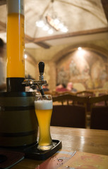 glass of beer with beer butt