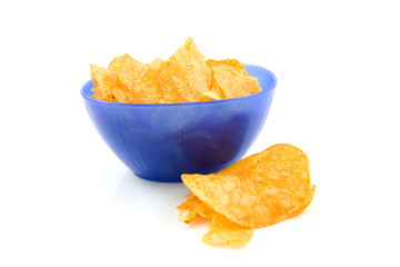 potato chips Bolognese in blue bowl over white background