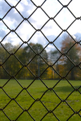 Black chain link park fence close up