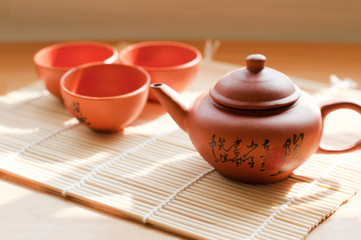 Chinese ceramic teapot and cups.