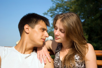Fototapeta premium Young caucasian couple in love relaxing outdoor