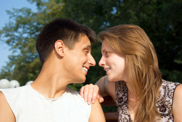 Young love couple smiling