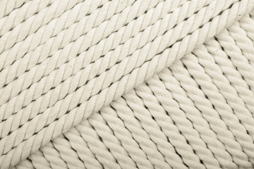 Heavy, white coiled rope.