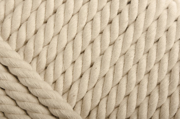 Heavy, white coiled rope.