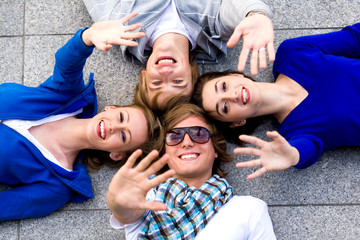 Friends waving hands