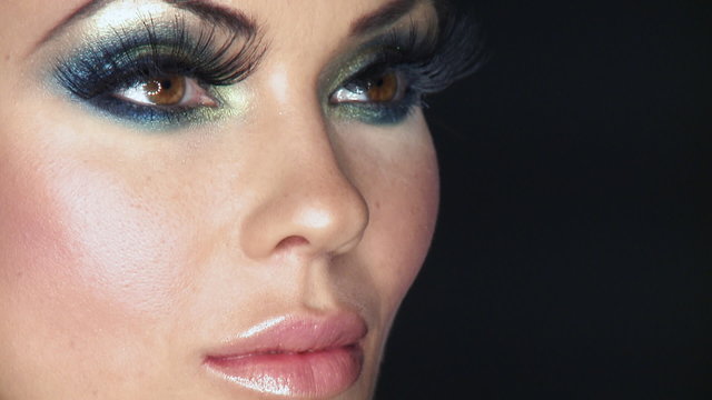 Portrait of beautiful sexy woman with outstanding makeup