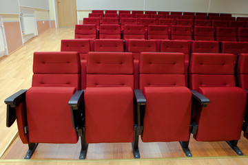 red chairs in the hall