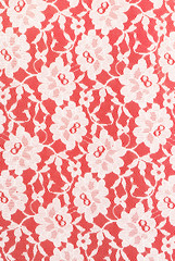 white lace on red background