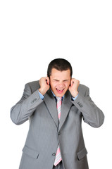 Stressed businessman is shut up his ears isolated on white