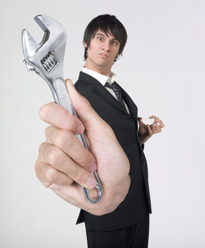 homme d'affaires cl&eacute; a molette