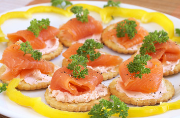Smoked salmon and cream cheese on crackers