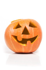 Creepy carved pumpkin face, with a smile