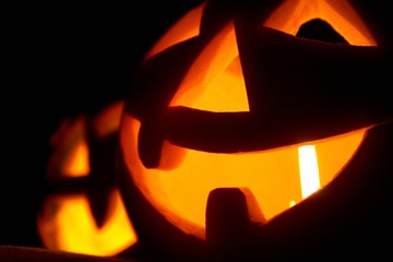 Creepy carved pumpkin face, with a smile
