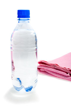 Bottle of water and towel fitness composition