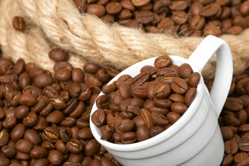 Cup in a grain of coffee