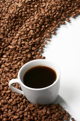 Cup with coffee, costing on coffee grain