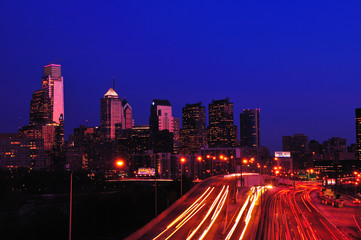 Fototapeta na wymiar Philadelphia Skyline at night with traffic light streaks