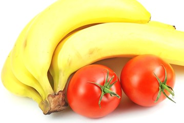Isolated banana and tomatoes