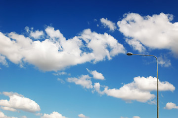 Street lamp against the dramatically overcast sky
