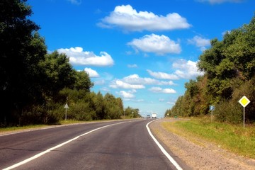 Grey road and blue sky