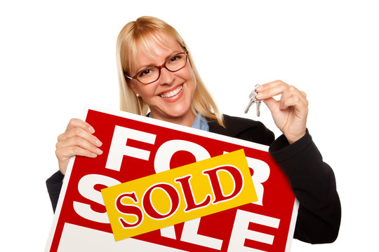 Attractive Blonde Holding Keys & Sold For Sale Sign