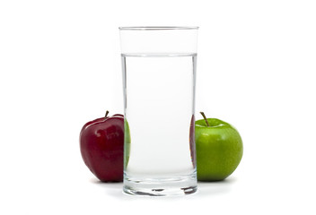 Apples with glass of water