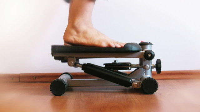 Woman's feet on stepper