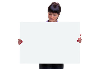Woman looking at a blank sign