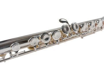 Obraz premium Detail of an Old Silver Flute on White Background