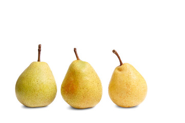Ripe yellow pears on a white.