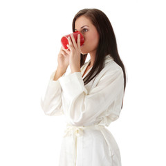 Young woman drinking morning coffee