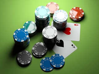 poker chips with two aces on green casino table