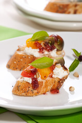 Tomatoes and cream cheese canapes